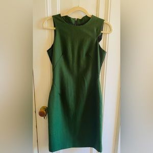 Straight green dress with faux black accents